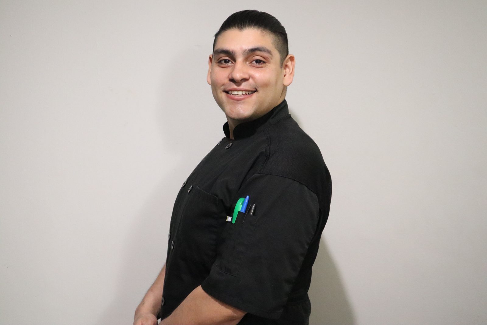 José, founder of Mise en Profit, in a kitchen